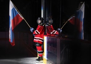 MONTREAL, CANADA - JANUARY 5: Team Russia flag bearer awaits the arrival of the Russia players prior to bronze medal game action against Sweden at the 2017 IIHF World Junior Championship. (Photo by Andre Ringuette/HHOF-IIHF Images)

